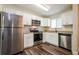 This kitchen offers stainless appliances, granite countertops, and ample storage space at 3312 Victory Palm Dr, Edgewater, FL 32141