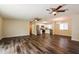 The open floor plan showcases hardwood flooring, an eat-in kitchen, and a dining area at 3312 Victory Palm Dr, Edgewater, FL 32141