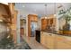 Gourmet kitchen with granite countertops, stainless steel appliances, and wood cabinets at 336 Highcroft Ct, Lake Mary, FL 32746