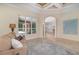 Open living room with backyard views, neutral walls and tiled floor at 336 Highcroft Ct, Lake Mary, FL 32746