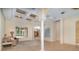Spacious living room with decorative ceiling, large windows, and neutral decor at 336 Highcroft Ct, Lake Mary, FL 32746