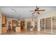 Living room features tile floors, a ceiling fan, and access to other rooms at 336 Highcroft Ct, Lake Mary, FL 32746