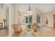 Cozy sitting area with comfortable chairs and view of the pool at 336 Highcroft Ct, Lake Mary, FL 32746