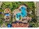Aerial view of the community pool and playground area, a great space for residents to enjoy outdoor activities at 3640 Sail Harbor Dr, Kissimmee, FL 34746