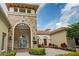 Beautiful clubhouse entrance with stone facade and well-maintained landscaping at 3640 Sail Harbor Dr, Kissimmee, FL 34746