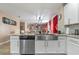 Open kitchen with stainless steel appliances, granite countertops, and a modern sink at 3640 Sail Harbor Dr, Kissimmee, FL 34746