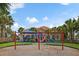 Colorful playground with slides and swings, perfect for Gathering fun at 3640 Sail Harbor Dr, Kissimmee, FL 34746