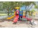 Community playground featuring colorful slides and play equipment at 3706 Andover Cay Blvd, Orlando, FL 32825