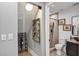 An indoor wine cellar, adjacent to a remodeled bathroom at 3706 Andover Cay Blvd, Orlando, FL 32825