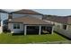 Aerial view of the fenced backyard and screen-enclosed lanai at 3823 Spruce Creek Dr, Lakeland, FL 33811