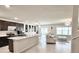 Open concept kitchen with stainless steel appliances and dining area at 3823 Spruce Creek Dr, Lakeland, FL 33811