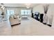 Open concept living room with view of dining area at 3823 Spruce Creek Dr, Lakeland, FL 33811