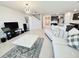 Spacious living room with plush seating and modern decor at 3823 Spruce Creek Dr, Lakeland, FL 33811