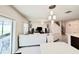 Bright living room with sliding glass doors to patio at 3823 Spruce Creek Dr, Lakeland, FL 33811