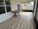 Inviting enclosed patio space featuring tiled flooring, offering a great space for outdoor relaxation at 3823 Spruce Creek Dr, Lakeland, FL 33811