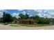 Wide angle street-view featuring a well-kept lawn and a single-story house at 385 Lynchfield Ave, Altamonte Springs, FL 32714