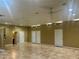 Spacious room with neutral walls, tile flooring, and multiple entryways at 385 Lynchfield Ave, Altamonte Springs, FL 32714