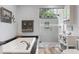Bright bathroom features a modern glass shower, soaking tub, and vanity with storage at 548 Timber Ridge Dr, Longwood, FL 32779