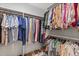 Walk-in closet featuring organized clothing racks and shoe storage at 548 Timber Ridge Dr, Longwood, FL 32779