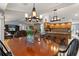 Open concept space with dining area and kitchen with bar seating at 548 Timber Ridge Dr, Longwood, FL 32779