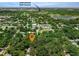 Aerial view showcasing property with close proximity to Dubsdread Golf Course and a picturesque lake at 610 Kittredge Dr, Orlando, FL 32805