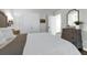 Bedroom featuring a comfortable bed, hardwood floors, and white walls at 610 Kittredge Dr, Orlando, FL 32805