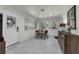 Bright dining room features backyard access and ample sunlight through large windows at 610 Kittredge Dr, Orlando, FL 32805