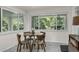 Dining room with big windows showcasing the yard view at 610 Kittredge Dr, Orlando, FL 32805