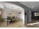 Elegant dining room featuring stylish lighting fixtures and a seamless flow into other living spaces at 7621 Brightwater Pl, Oviedo, FL 32765