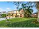 Two-story home with mature landscaping, and a three car garage at 7621 Brightwater Pl, Oviedo, FL 32765
