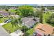 Aerial view of the property featuring its blue exterior and surrounding landscape at 857 Marquis Ct, Kissimmee, FL 34759