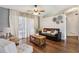 Open concept living room with modern decor and plenty of natural light, great for entertaining at 857 Marquis Ct, Kissimmee, FL 34759