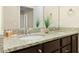Bright bathroom with a double sink vanity and granite countertops at 8912 Rhodes St, Kissimmee, FL 34747