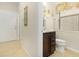 Bathroom with granite countertop sink and toilet at 8912 Rhodes St, Kissimmee, FL 34747