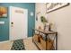 Cozy entryway with tile flooring, a welcome sign, and stylish accents, creating a warm and inviting space at 8912 Rhodes St, Kissimmee, FL 34747