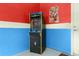 Close-up of an arcade game inside a fun and vibrant game room with custom paint at 8912 Rhodes St, Kissimmee, FL 34747