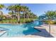 Relaxing lazy river with calm water, island vegetation, and shaded cabana seating at 8912 Rhodes St, Kissimmee, FL 34747