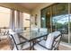 Covered outdoor dining space featuring sliding door access to the interior, and a view of the exterior at 8912 Rhodes St, Kissimmee, FL 34747