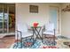 Covered outdoor seating area featuring an outdoor rug and access to the exterior of the property at 8912 Rhodes St, Kissimmee, FL 34747