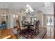 Dining room with ample natural light, stylish furniture, and convenient butler's pantry at 9324 Carolview Way, Orlando, FL 32836
