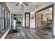 Well-lit exercise room with workout equipment and natural light, offering a private fitness space at 9324 Carolview Way, Orlando, FL 32836