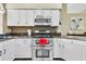 Well-appointed kitchen with stainless steel appliances, double oven, and ample storage at 9324 Carolview Way, Orlando, FL 32836