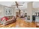 Spacious living room with fireplace, hardwood floors, and skylights offers bright, comfortable living at 9324 Carolview Way, Orlando, FL 32836