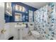 Charming bathroom featuring a pedestal sink and coastal-themed decor at 9543 Buxton, Orlando, FL 32817