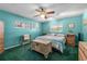 Comfortable bedroom with vintage furniture, fan lighting and two windows providing natural light at 9543 Buxton, Orlando, FL 32817
