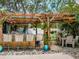 Outdoor kitchen and dining area perfect for entertaining near the pool at 9543 Buxton, Orlando, FL 32817