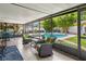 Enclosed lanai with seating area that views a beautiful pool at 9543 Buxton, Orlando, FL 32817