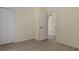 A bedroom with closet and doorway at 1065 Universal Rest Pl, Kissimmee, FL 34744