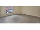 A bright room with natural light shining through a large window at 1065 Universal Rest Pl, Kissimmee, FL 34744