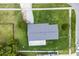 Overhead view of property and shows a large lawn and traditional home design in an established neighborhood at 10800 Fernando St, Orlando, FL 32825